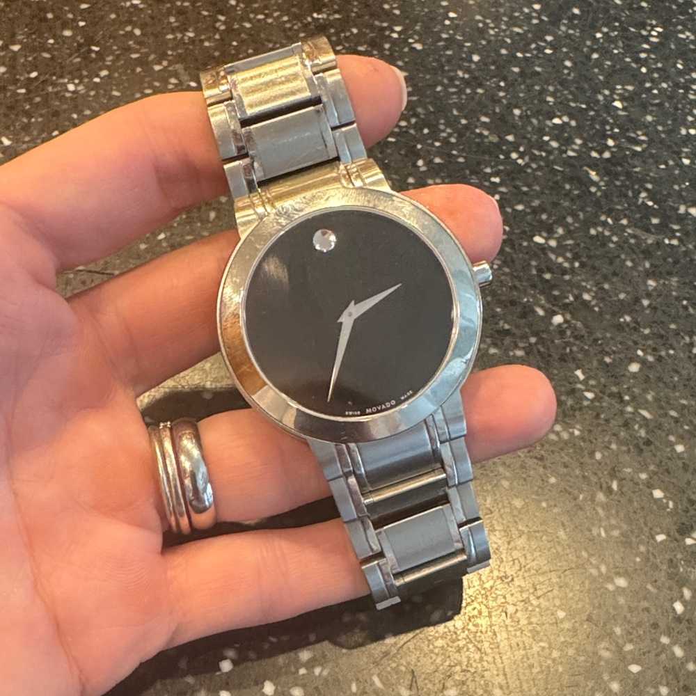 Movado Black and Silver Timepiece